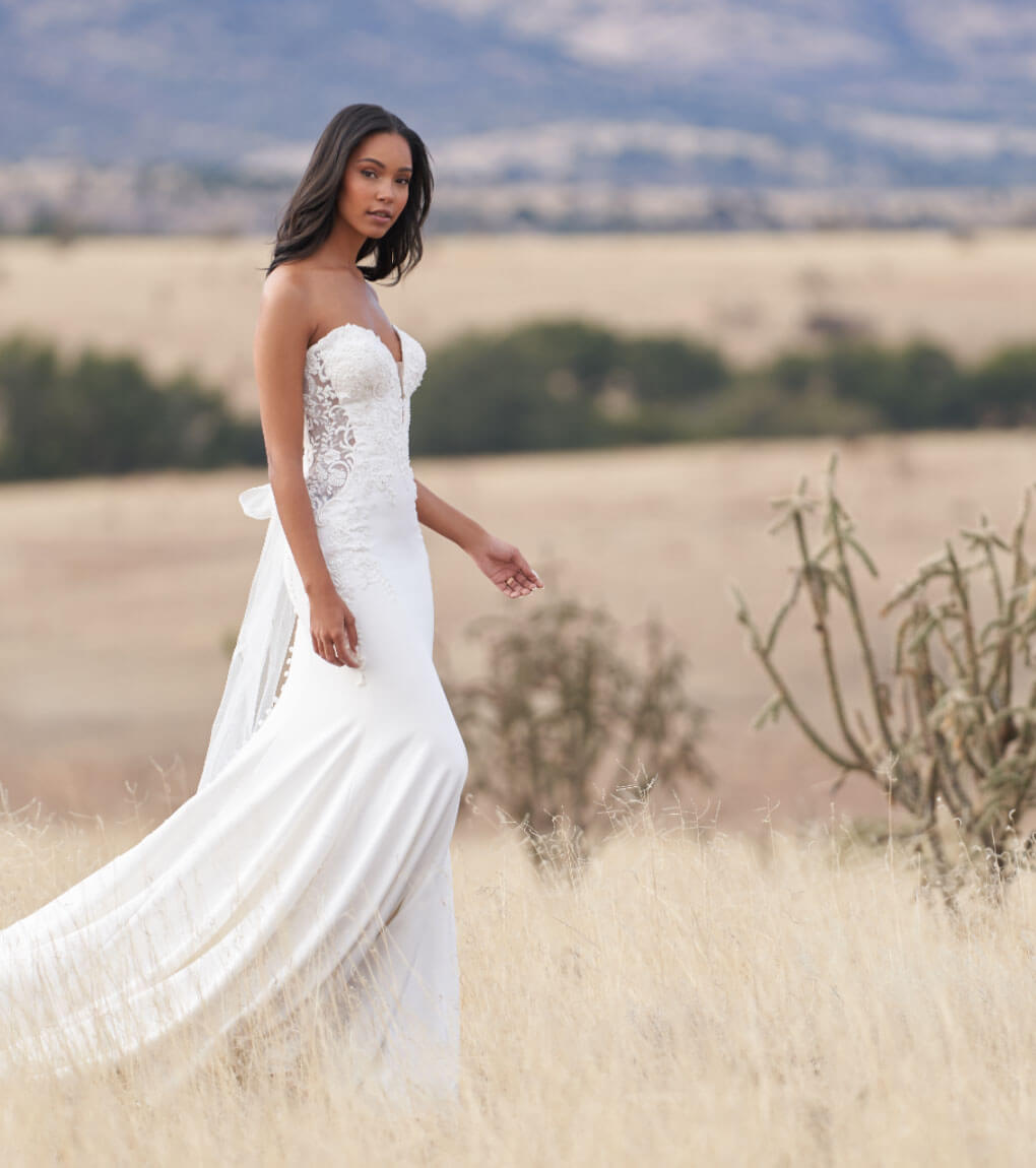 Model wearing a white gown