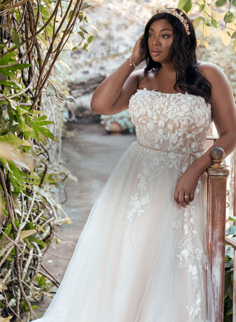 Model wearing a white Plus-Size Style Gown. Mobile Image