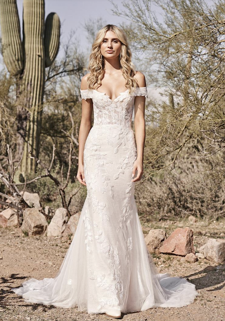 Model wearing a white gown